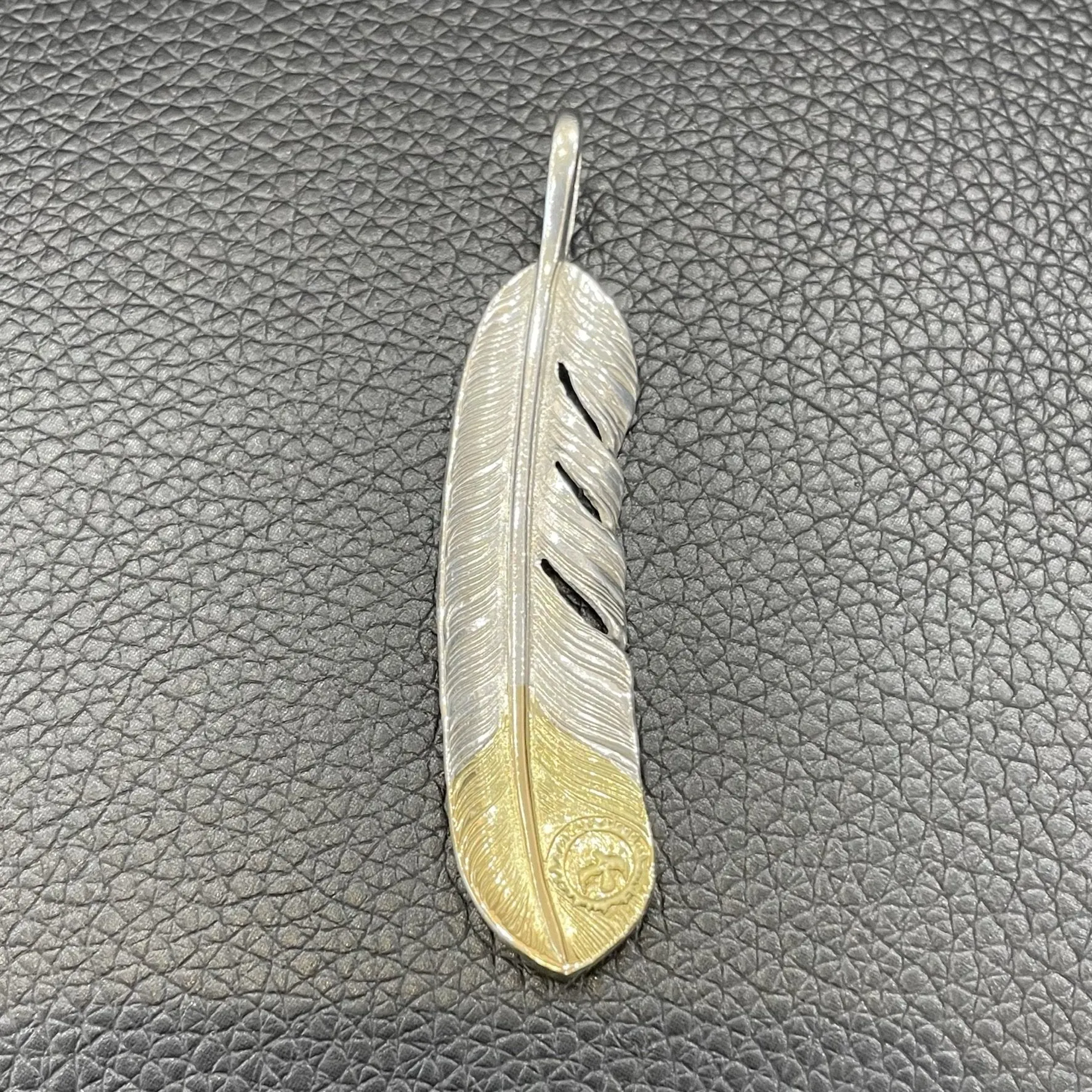 Goros Gold Tip Feather - Facing Right