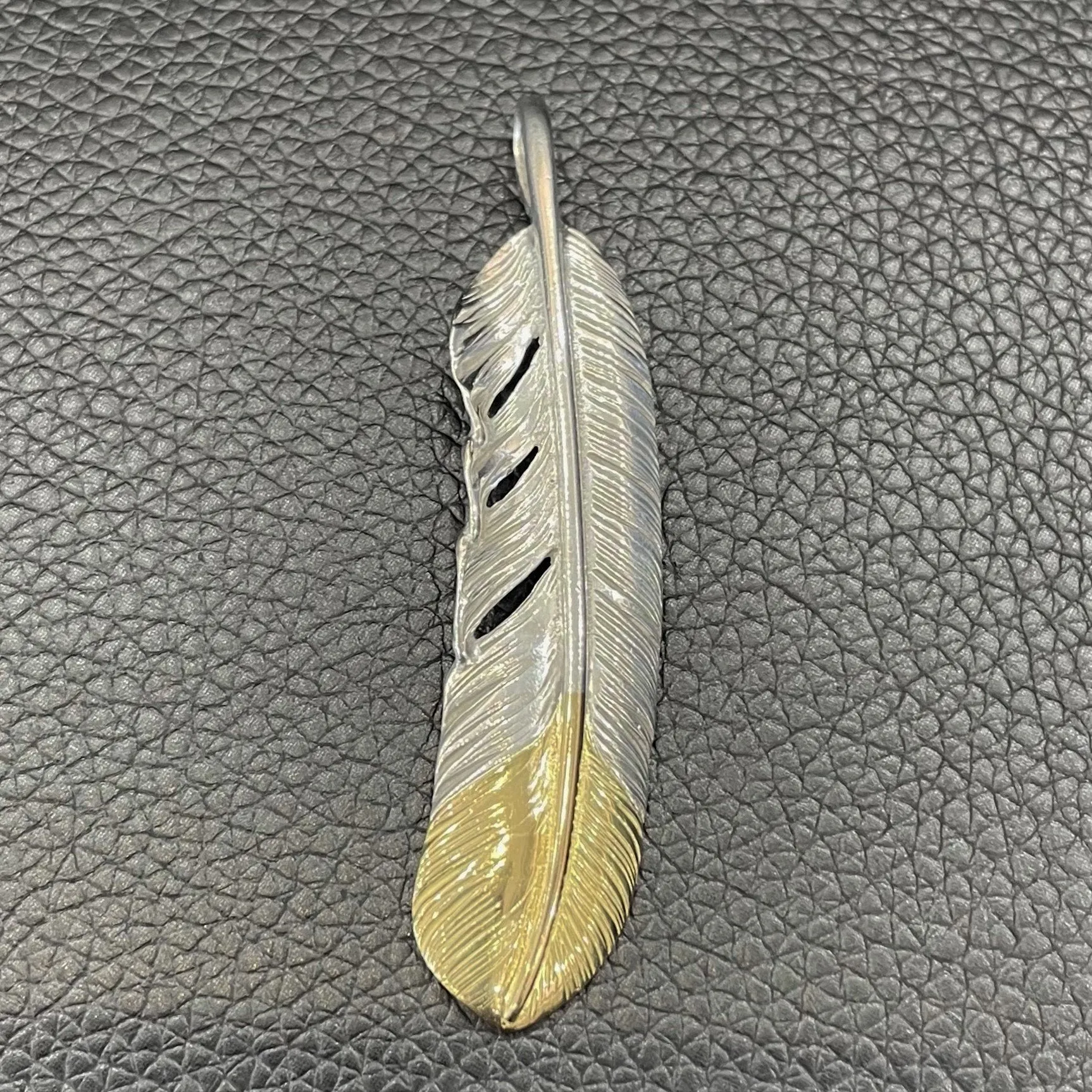 Goros Gold Tip Feather - Facing Right