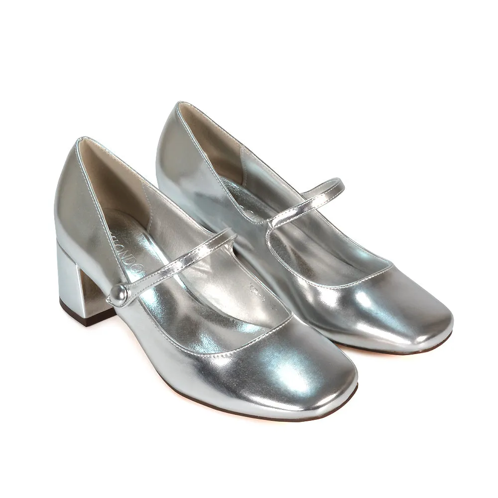 Rhea Mid Block Heel Closed Toe Mary Jane Shoes With Strap in Black Patent