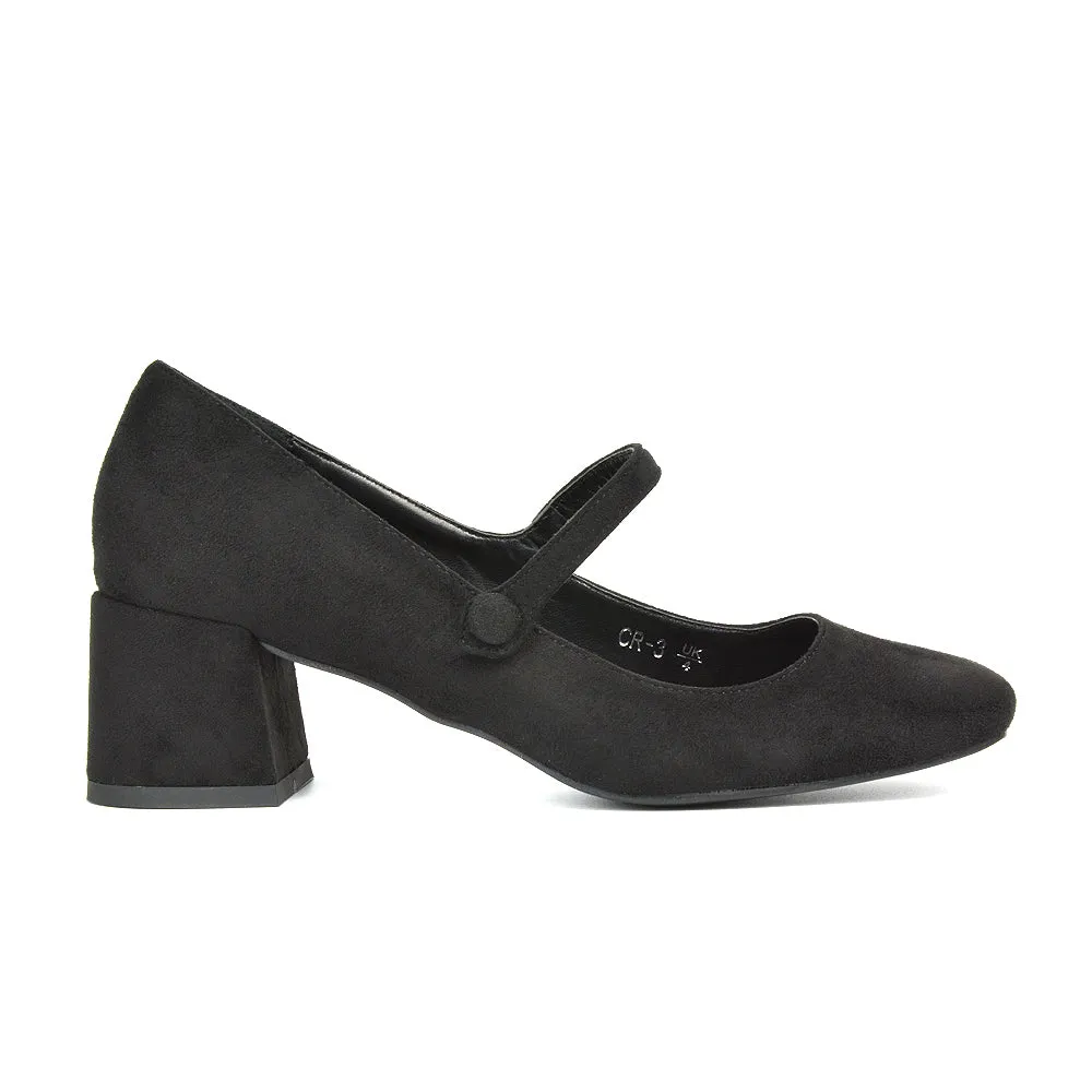 Rhea Mid Block Heel Closed Toe Mary Jane Shoes With Strap in Black Patent