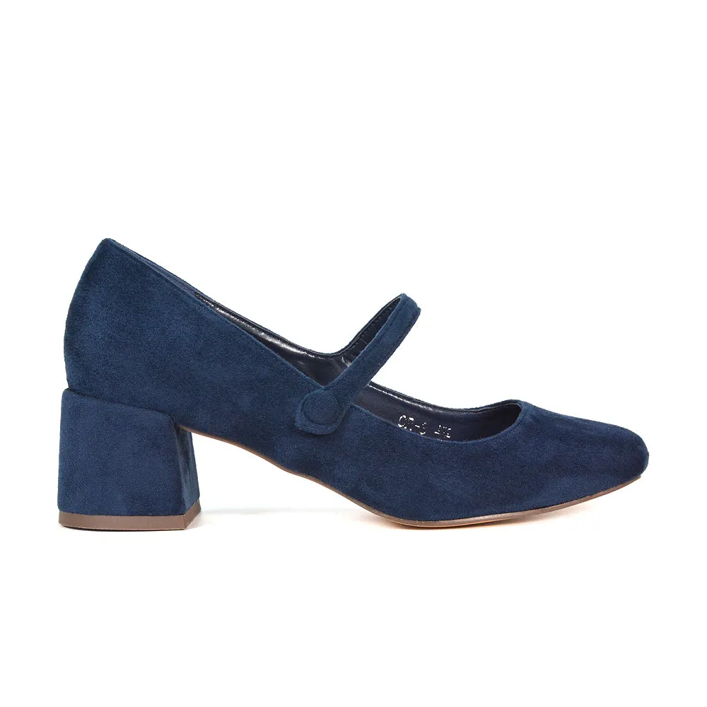 Rhea Mid Block Heel Closed Toe Mary Jane Shoes With Strap in Black Patent