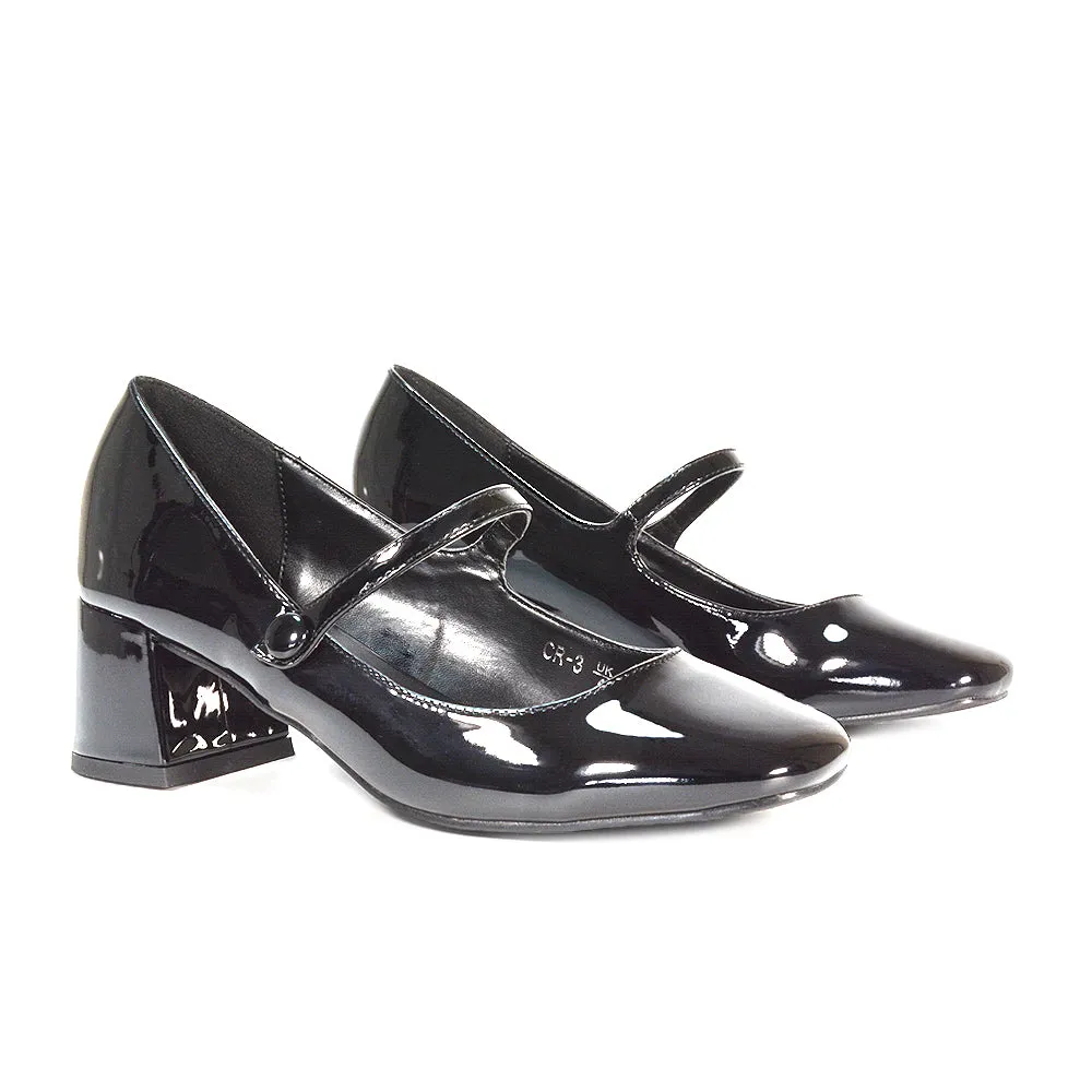 Rhea Mid Block Heel Closed Toe Mary Jane Shoes With Strap in Black Patent