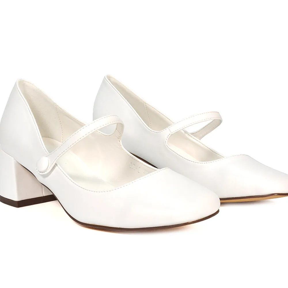 Rhea Mid Block Heel Closed Toe Mary Jane Shoes With Strap in Black Patent