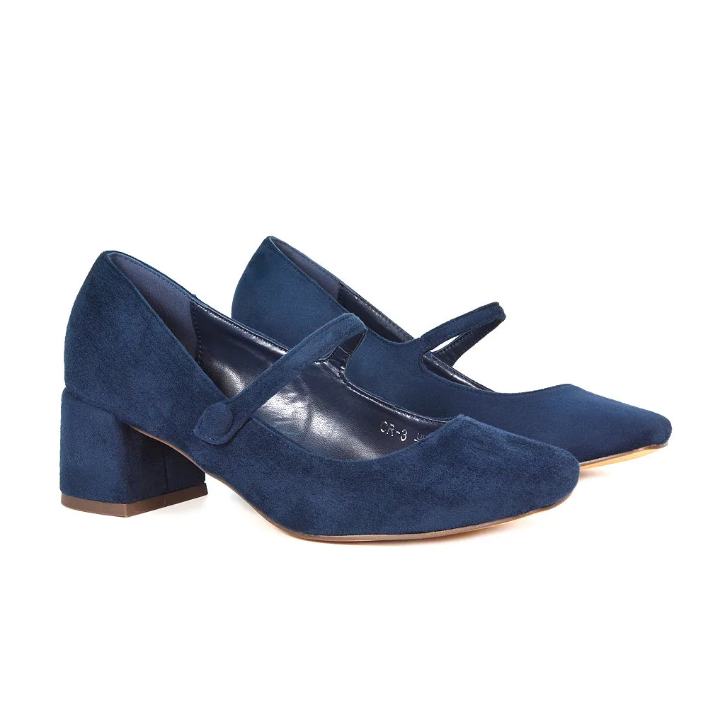 Rhea Mid Block Heel Closed Toe Mary Jane Shoes With Strap in Black Patent