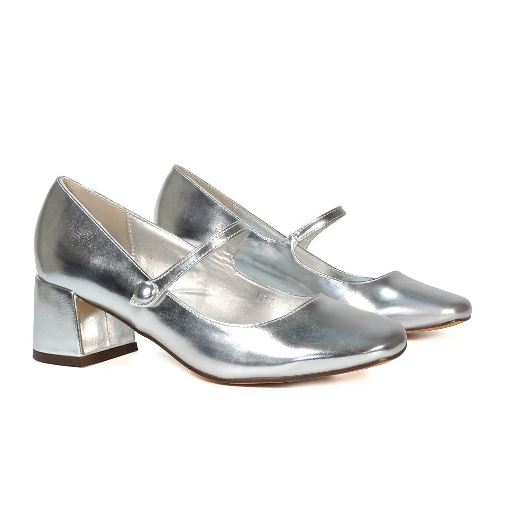 Rhea Mid Block Heel Closed Toe Mary Jane Shoes With Strap in Black Patent