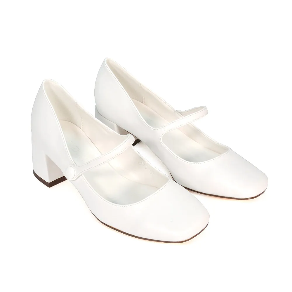 Rhea Mid Block Heel Closed Toe Mary Jane Shoes With Strap in Black Patent