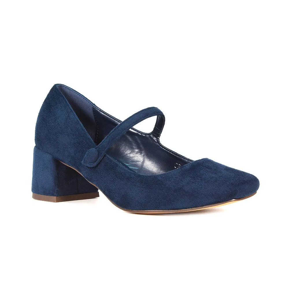 Rhea Mid Block Heel Closed Toe Mary Jane Shoes With Strap in Black Patent