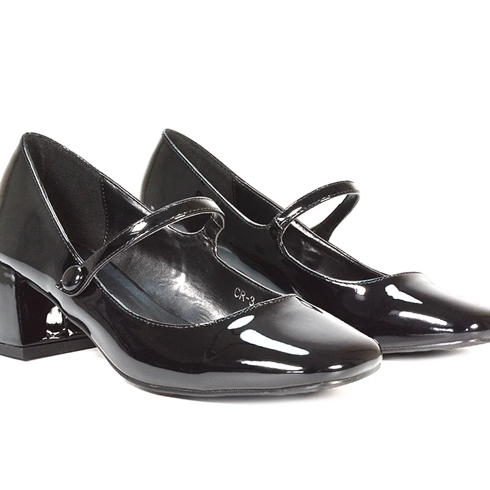 Rhea Mid Block Heel Closed Toe Mary Jane Shoes With Strap in Black Patent