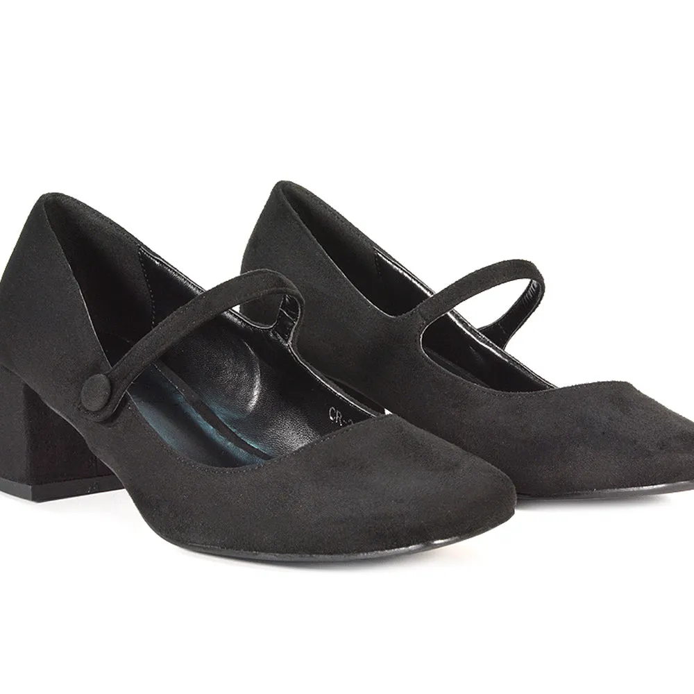 Rhea Mid Block Heel Closed Toe Mary Jane Shoes With Strap in Black Patent