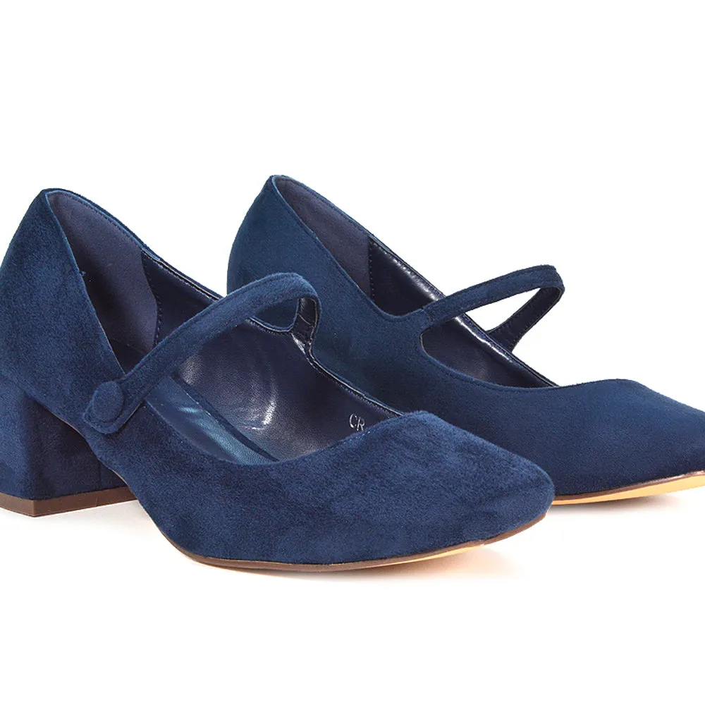 Rhea Mid Block Heel Closed Toe Mary Jane Shoes With Strap in Black Patent