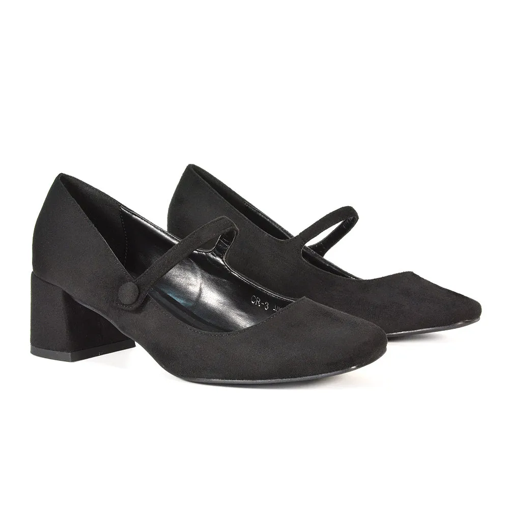 Rhea Mid Block Heel Closed Toe Mary Jane Shoes With Strap in Black Patent